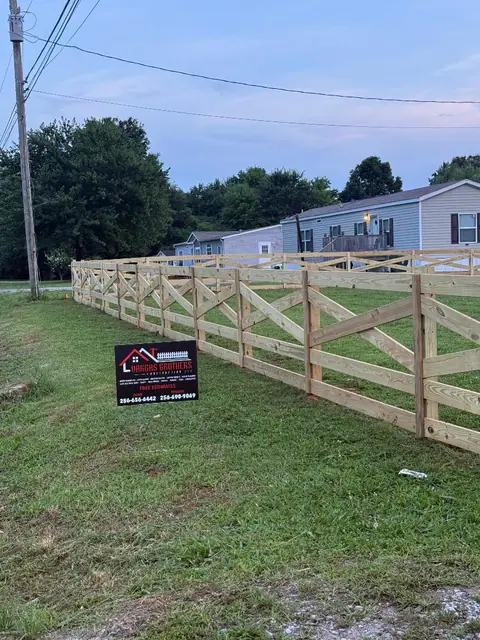Crossbuck ranch fence with a Vargas Brothers yard sign