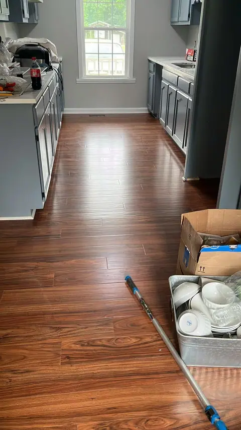 Kitchen with new dark wood plank flooring